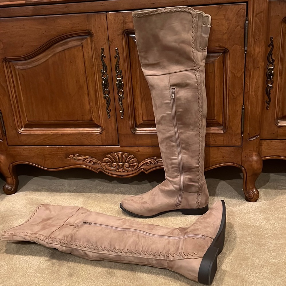 Tall, tan, detailed XOXO boots.